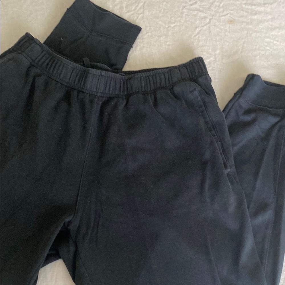 Nike Black Sweatpants with Elastic Waistband and Tapered Legs